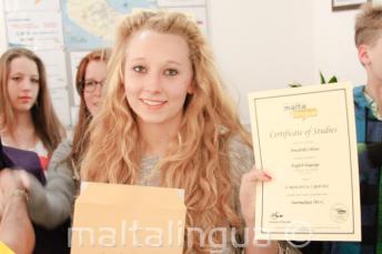 junior language student with her curs de engleză certificate
