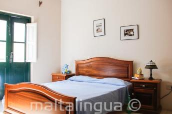 A dormitor in homestay accommodation in St Julains