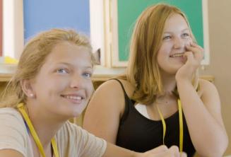 studenți listening to the profesor